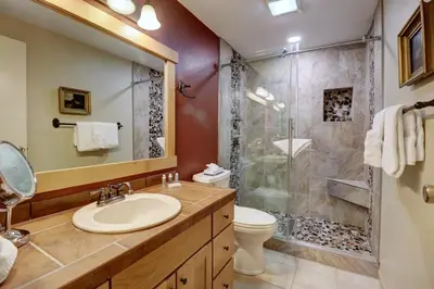 a bathroom with a sink and a shower at 1250 Willow Grove townhouse in Silverthorne