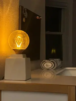 a light sitting on a counter in a room at Entire Private Garden-Level Retreat in Englewood