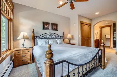 a bedroom with a bed and a ceiling fan at Lone Eagle 3013 condo in Keystone