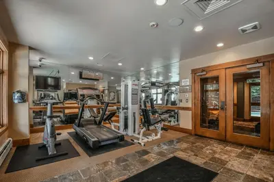 a fitness room with a gym with tread machines at Lone Eagle 3013 condo in Keystone