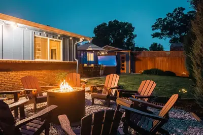 a backyard with chairs and a fire pit at Wellness Retreat - Sauna Cold Plunge & Hot Tub in Broomfield