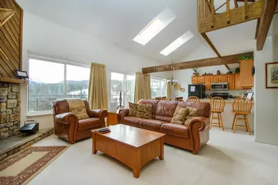 a living room with a couch and chairs and a table at Buffalo Ridge 305E in Silverthorne