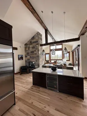 a large kitchen with a large island in a room at Serenity at Sherwood - Mid Term Rental in Breckenridge