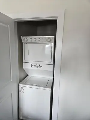 a kitchen with a white stove and a refrigerator at Sunny Beautiful Apt, 2nd Level, 2Bedroom, 2Bath, Kitchen, Dining in Denver