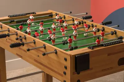 a large wooden chess board with balls in it at Summit Solace LUXE 360 Views Hot Tub Games in Bailey