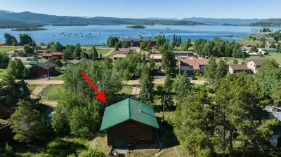 an aerial view of a village with a house and a lake at Pet Friendly, 4 Bedrooms Plus Game Room, Easy Walk to Lake Granby & Beacon Landing Marina in Grand Lake