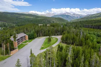 an aerial view of a road in the mountains at Beaver Village 1712 - Nicely Updated, 2 Queens Plus 2 Twins, Pool, Hot Tubs, Sauna in Winter Park