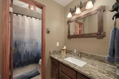 a bathroom with a sink and a mirror at Lula in Grand Lake