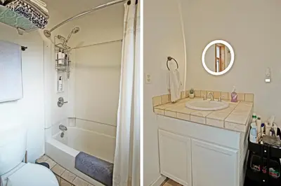 a bathroom with a tub and a sink and a shower at New Listing, Great Backyard with Firepit, Pet Friendly, Wood Burning Stove in Grand Lake
