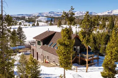 an aerial view of a house in the snow at New Hot Tub, Firepit, Laundry, Big Front Deck with Great Views in Grand Lake
