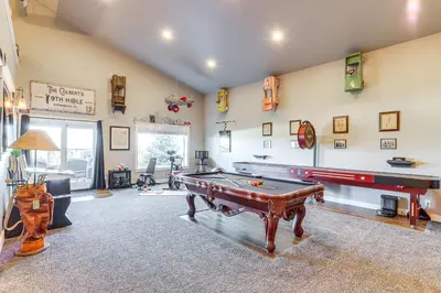 a large room with a pool table in it at Private Hot Tub and Game Room Keenesburg Getaway! in Hudson