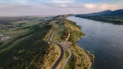 an aerial view of a road on an island in the water at Mosaic Modern - Dog Friendly, Pool and King Suite in Fort Collins