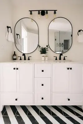 a bathroom with white cabinets and two mirrors at House of Noir Elan Stunning 6BR Designer Retreat in Arvada