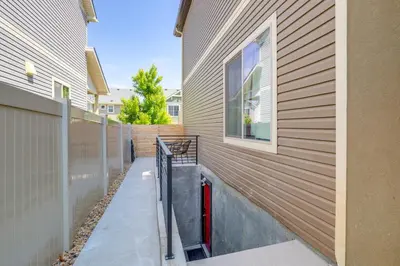 a building with a walkway between two buildings at 16 Mi to Dtwn Denver Modern Apt with Patio in Denver