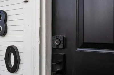 a black door with a black handle on a house at Spacious and Comfy Close to Everything Backyard in Longmont