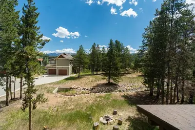 an aerial view of a yard with a house at 4BR Fraser Getaway Hot Tub Sleeps 10 in Fraser