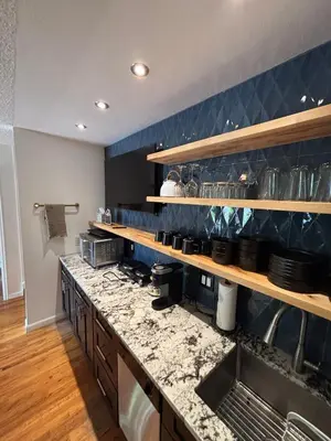 a kitchen with a sink and a counter top at Modern Getaway with Private Balcony in Denver