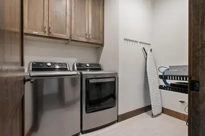 a kitchen with a stove and a refrigerator at Aspen View Chalet home in Fraser