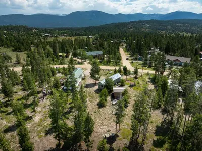 an aerial view of a resort surrounded by trees at Zig Zag Retreat, Cozy, Pet-Friendly Escape Near Lakes, and Rocky Mountain National Park in Grand Lake