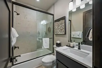 a bathroom with a sink and a shower at Blue Horizon Chalet home in Winter Park