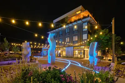 a hotel with blue sculptures in front of a building at The Overlook - Luxe Old Town Condo with King Suite in Fort Collins