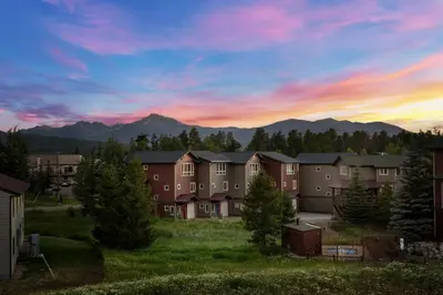 an apartment complex with mountains in the background at 281 W Meadow Mile #4 in Fraser