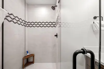 a shower in a bathroom with a glass door at 281 W Meadow Mile #4 in Fraser