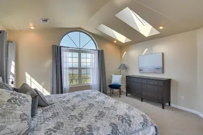 a bedroom with a bed and a dresser and a window at Mountain-View Conifer Gem Near Hiking and Fishing in Conifer