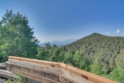 a view of the mountains from the top of a fence at Mountain-View Conifer Gem Near Hiking and Fishing in Conifer