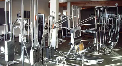 a gym with lots of cardio equipment in it at Our Mountain Blessings Condominium Town Home - peaceful, cozy, and family friendly mountain getaway! The most ideally located unit in Meadow Ridge Resort, in Fraser