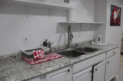 a kitchen counter with a sink and two sinks at Large Guest Suite with Private-Cozy-Central 1-BD 1-BT & Kitchen in Greenwood Village