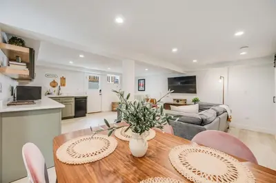 a kitchen and living room with a table and chairs at Cozy Garden Suite by Sloan's Lake and Tennyson! in Wheat Ridge