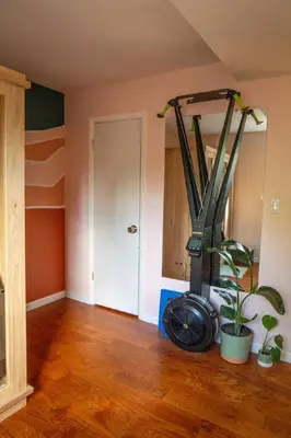 an empty room with a plant and a treadmill at Dog Friendly Oasis Private Hot Tub with Sauna in Boulder
