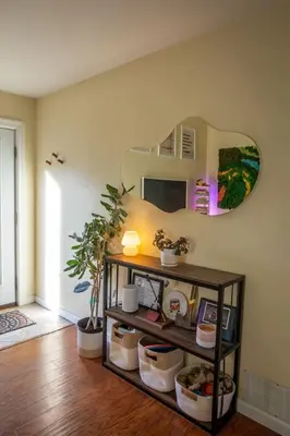 a room with a shelf with a mirror on the wall at Dog Friendly Oasis Private Hot Tub with Sauna in Boulder