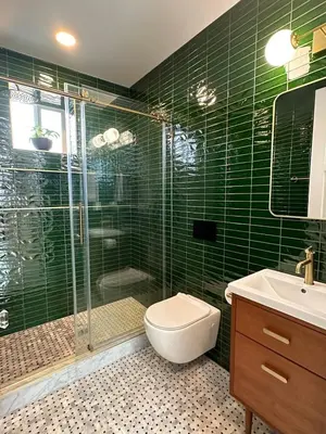 a green tiled bathroom with a toilet and a shower at NEW REMODEL Denver Luxury Home with Private HOT TUB in Denver