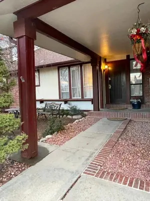 a front porch of a house with a patio at Sunny and Spacious, Hottub, Piano, Guitars, Fenced Yard, Pets Welcome, LGBT Friendly in Westminster
