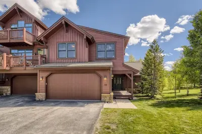 a large house with a garage at Highland Greens 42 in Breckenridge