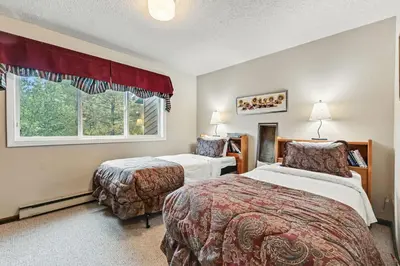 a hotel room with two beds and a window at Meadow Creek Retreat Near Trails and Downtown in Frisco