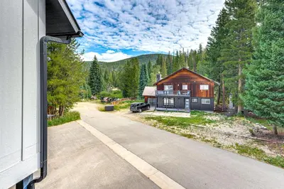 an aerial view of a house with a driveway at Ski-InandSki-Out Gemini Lift Access! Home with Hot Tub in Winter Park