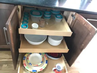 a cupboard with bowls and dishes in a kitchen at Rancho la Chula - Gambling Golf Hiking Hot Tub! in Black Hawk