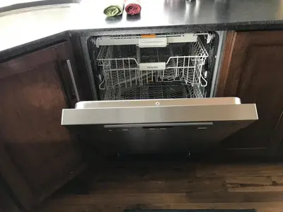 a dishwasher with a dish rack inside of it at Rancho la Chula - Gambling Golf Hiking Hot Tub! in Black Hawk