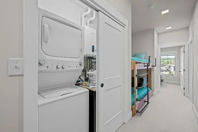 a laundry room with a washer and dryer at 78311 US HWY 40 Unit 6 in Winter Park