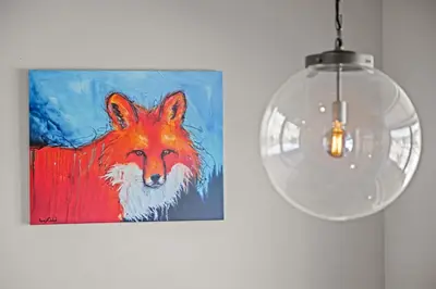 a painting of a dog and a light fixture at 78311 US HWY 40 Unit 6 in Winter Park