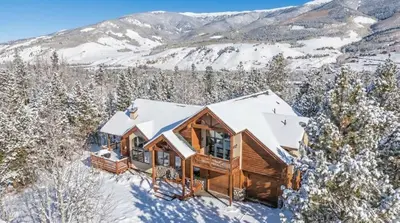 an overhead view of a log cabin in the snow at Modern Mountain Stay Hot Tub Fire Pit and Views in Silverthorne