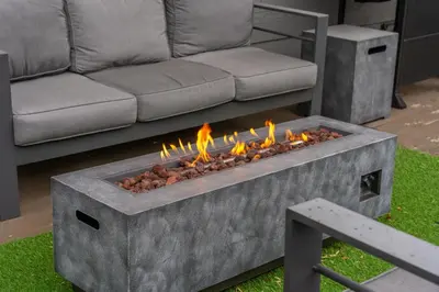 a fire pit in a living room with a couch at Modern 4BR Family Friendly Retreat with Hot tub in Arvada