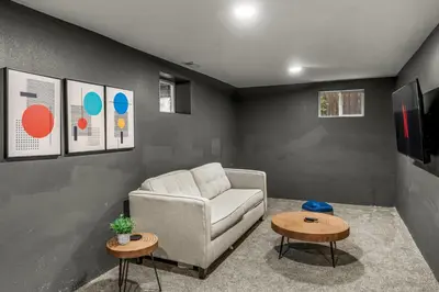 a living room with a couch and two tables at Modern 4BR Family Friendly Retreat with Hot tub in Arvada