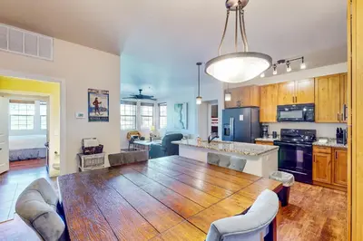 a kitchen and dining room with a large wooden table at Granby Ranch H103 in Granby