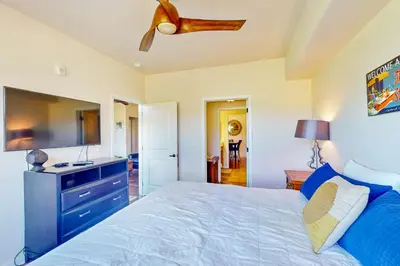 a bedroom with a bed and a flat screen tv at Granby Ranch H103 in Granby