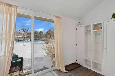 a room with a large window and a sliding glass door at New! Cozy north Boulder guesthouse! in Boulder