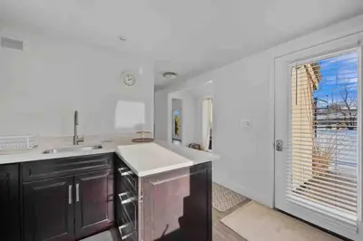 a kitchen with a sink and a window at New! Cozy north Boulder guesthouse! in Boulder